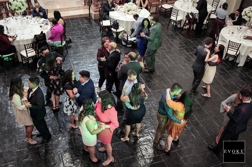 Overhead view of couples dancing on the ballroom floor at The Bell Tower on 34th, Houston, TX.