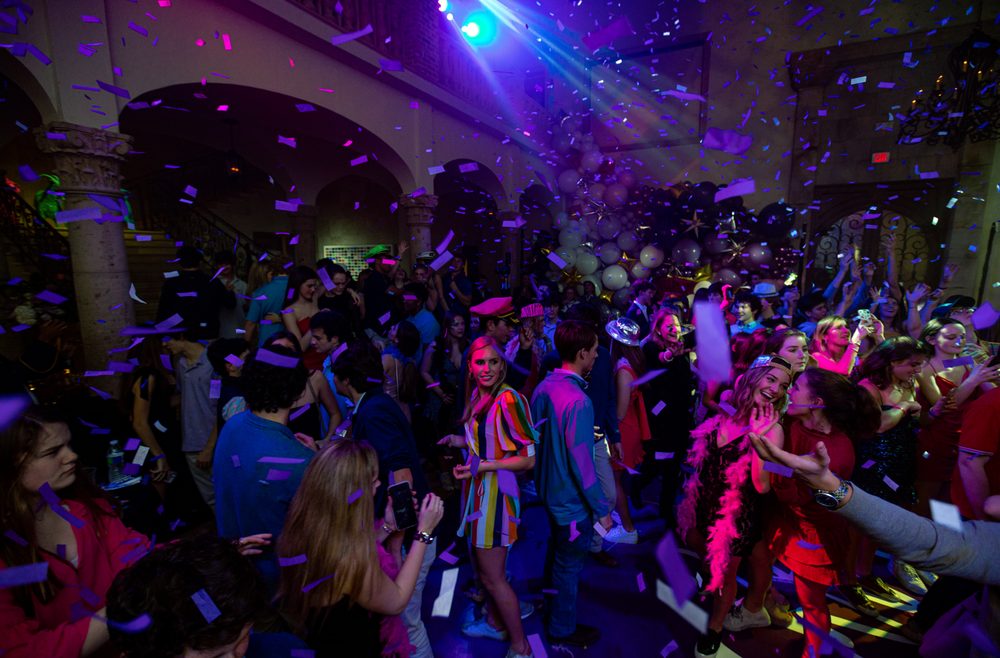 Confetti and blue purple stage lighting over the dance floor at The Bell Tower on 34th, Houston, TX.